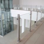 Modern,Glass,Elevator,And,Glass,Railings