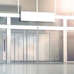 Blank,White,Signage,On,The,Store,Glass,Doors,Entrance,Mockup,