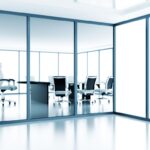 Empty,Meeting,Room,Behind,A,Glass,Partition,In,Modern,Cubicle